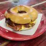 Breakfast Sandwich #1 — Bagel with sausage, bacon, or ham, plus egg and cheese